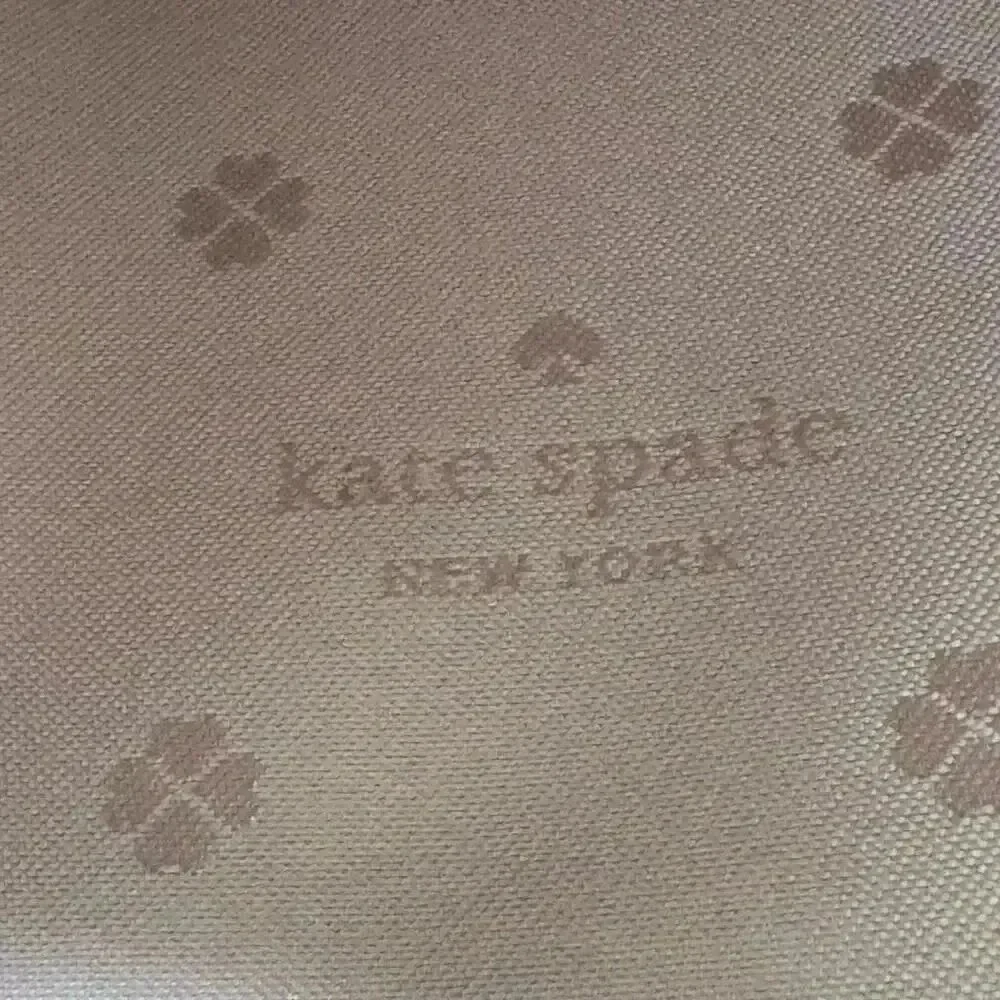 Kate Spade New York Polly Medium Pebble Leather Wristlet in Black